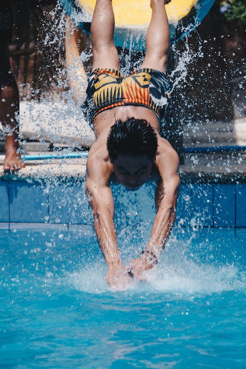 a male swimmer training in the swimming pool